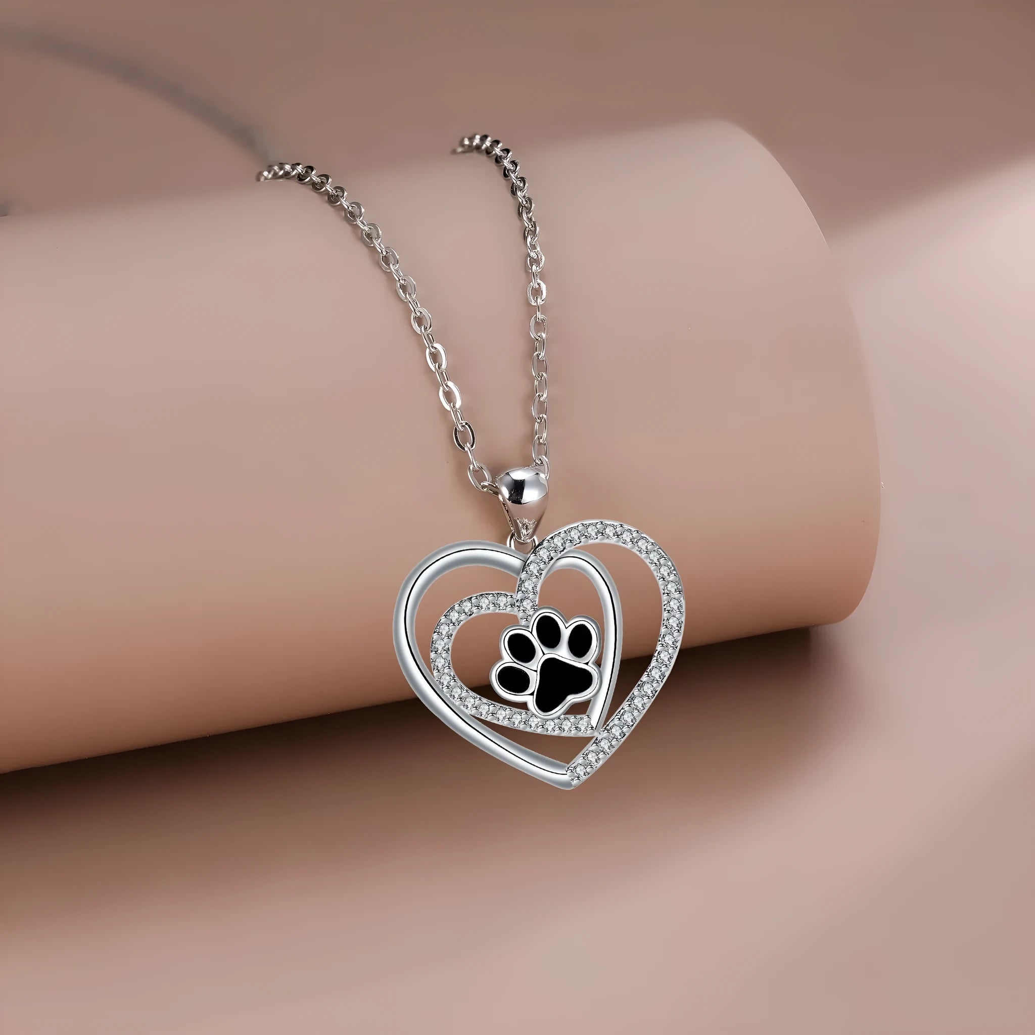 Dog's paw footprints necklace with heart pendant on cross chain