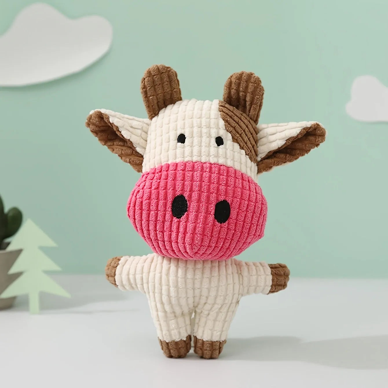Colourful animal-shaped plush dog chew toy with squeaker for small dogs.