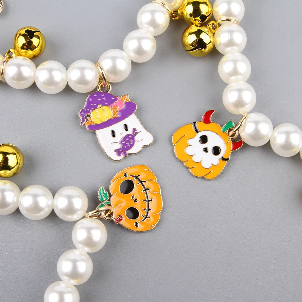 Halloween cat collar with pearl necklace decoration showing three pumpkin design variations