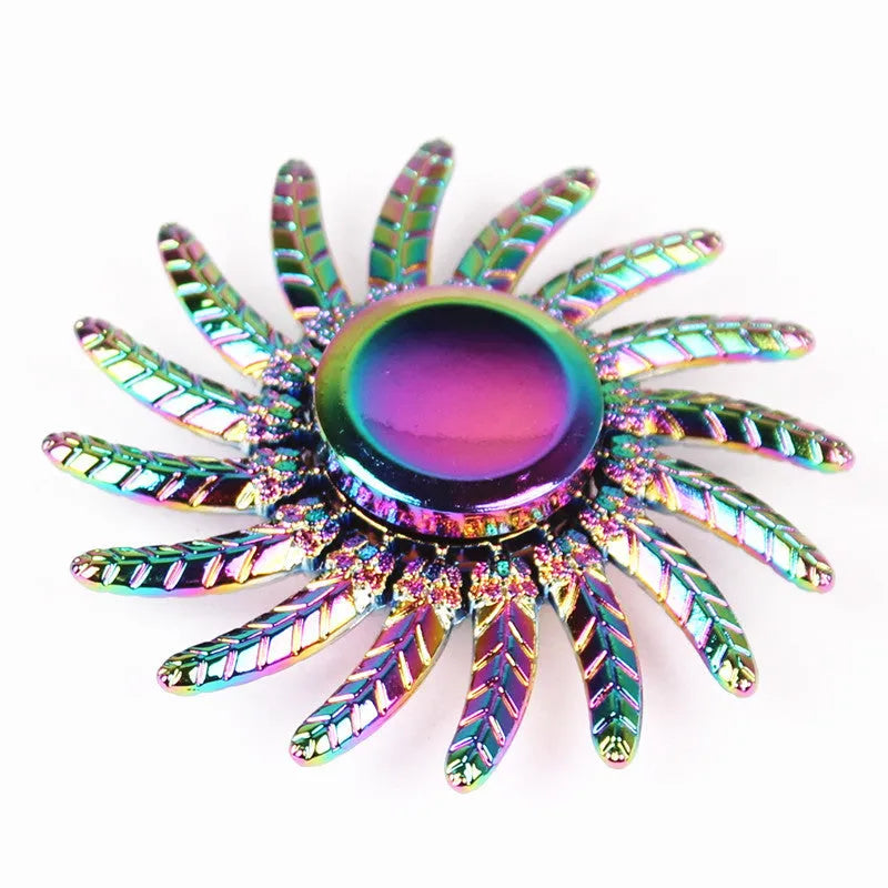 Colourful alloy fidget spinner with six axis design and electroplated finish on a light background