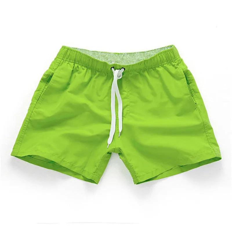 Men's straight leg beach shorts in polyester available in multiple colours and plus sizes.