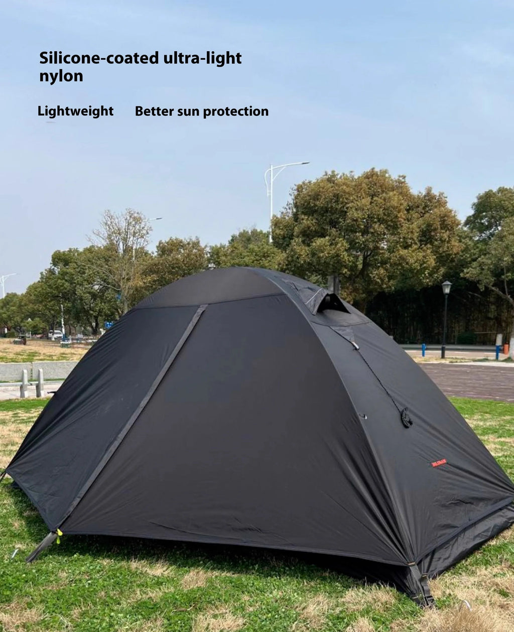 Single person camping tent with aluminium poles in black colour showing double-layer construction