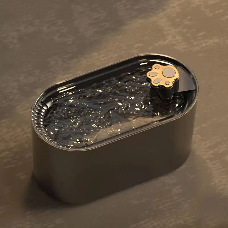 Berlin blue automatic pet water fountain with filter on a kitchen floor.