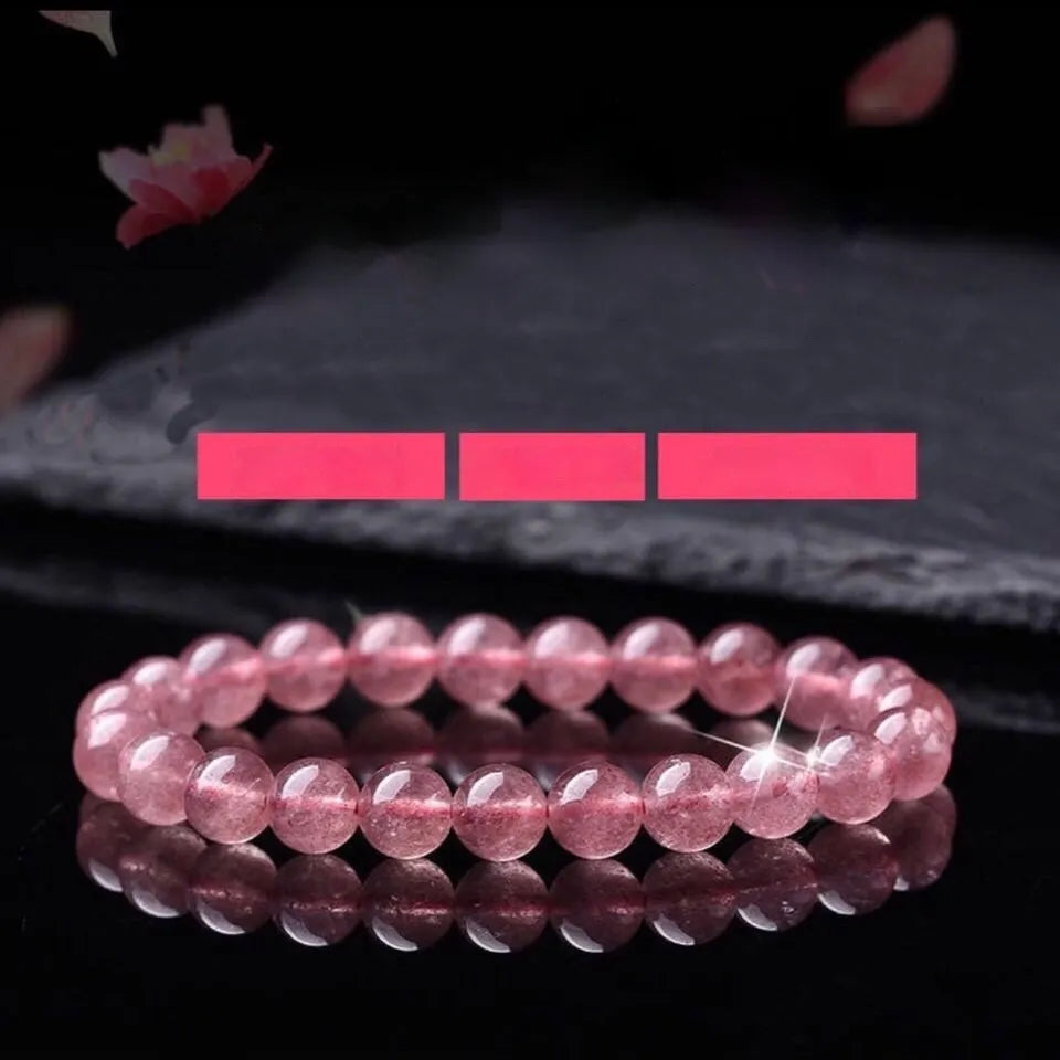 Women's strawberry quartz crystal bracelet with polished beads in three sizes