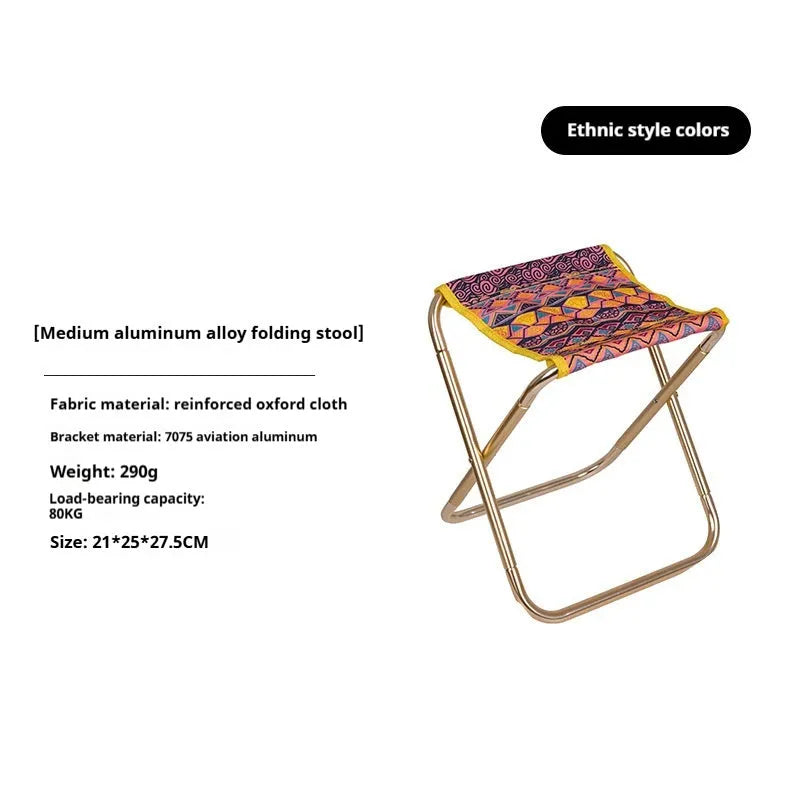 Black ethnic style aluminium alloy folding stool in open position for outdoor seating