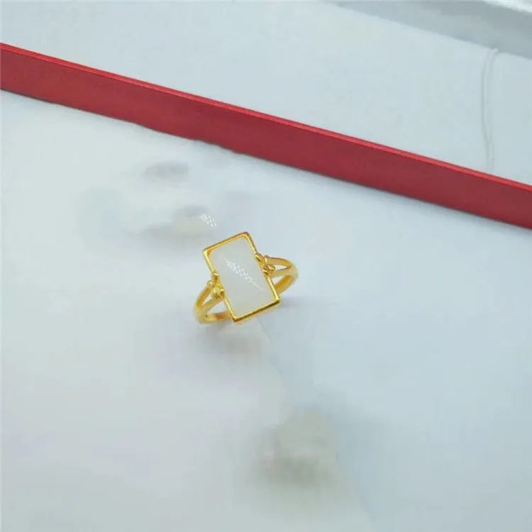 Adjustable brass gold-plated ring with electroplated finish and artificial gemstone accents