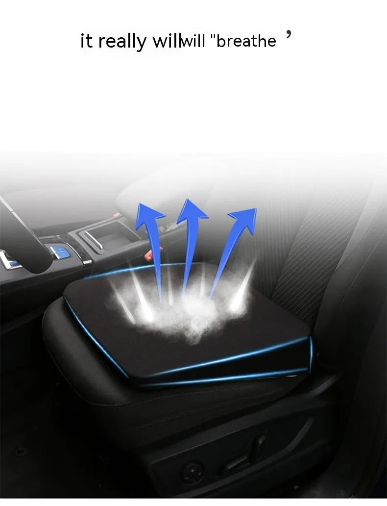Black car heightening seat cushion with thick foam construction measuring 42x39x6cm