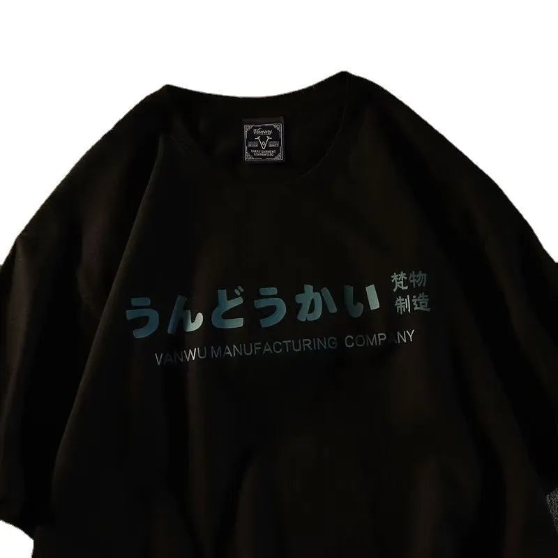Loose fit pure cotton short sleeve T-shirt for adults in black, shown in a casual setting.