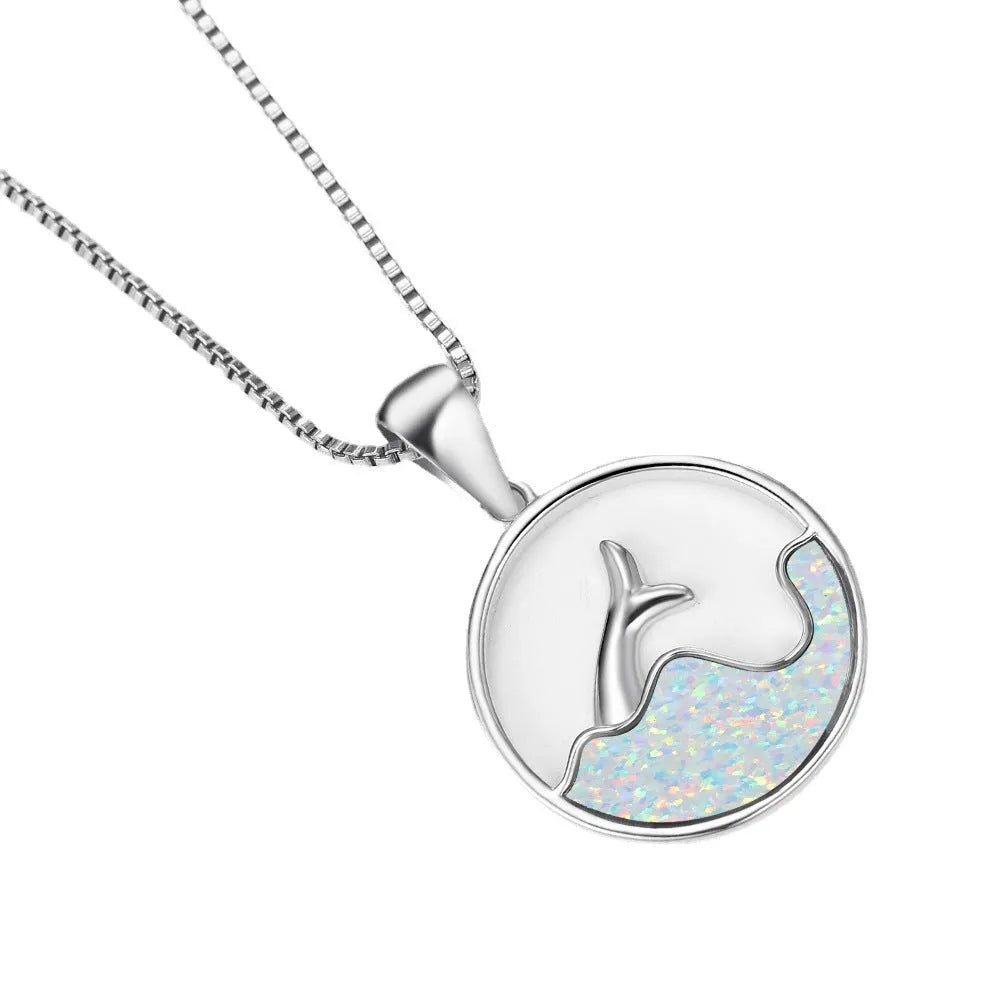 Geometric sea fishtail pendant necklace with an electroplated white gold finish and an opal colour variant.