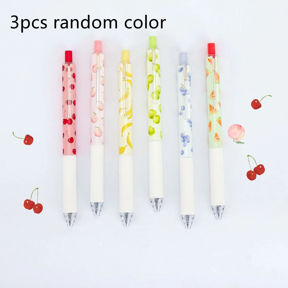 Three fruit-scented pressurised pens with push-button mechanisms and 0.5mm black refills