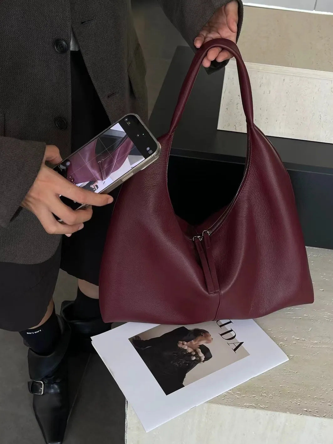 Genuine leather crescent underarm bag in ankarat red with sandwich pocket and single shoulder strap
