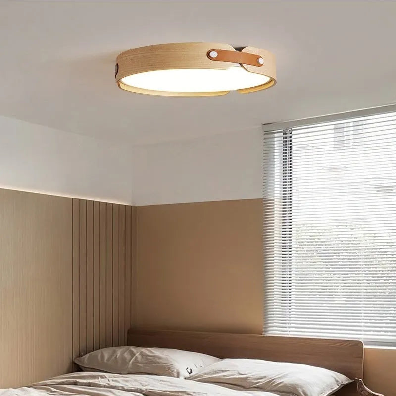 Japanese-style wooden ceiling lamp with PMMA lampshade in bedroom setting showing warm light illumination