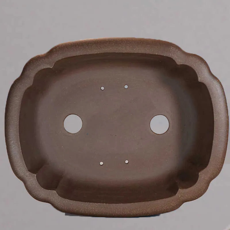 Purple clay rectangular flower pot with antique design measuring 51x41x14cm