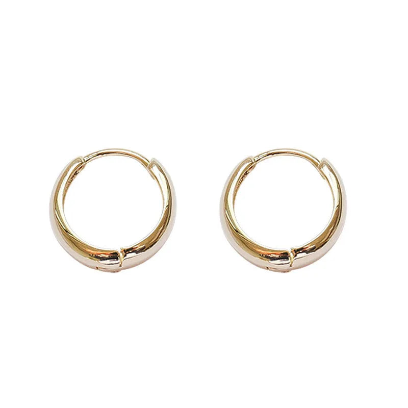 Women's geometric water drop earrings in gold and silver electroplated finishes with minimalist retro design