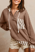 Straw yellow hoodie with waffle texture stripes and patchwork design featuring button neck and drawstring hood