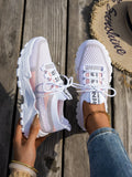 Women's Flyknit mesh lace-up sneakers in various colours on a flat rubber sole.