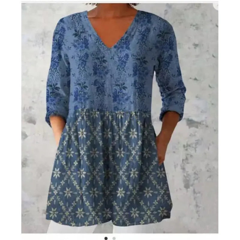 Women's printed loose dress with 3/4 sleeves and wide waist in colourful pattern