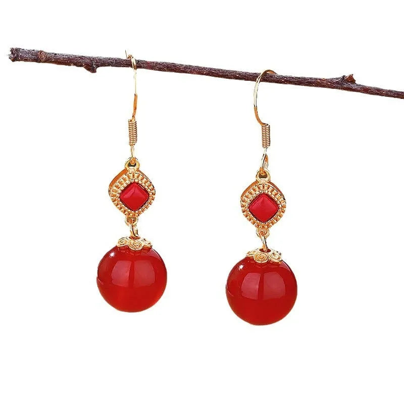 Southern Red Agate round bead earrings with S925 silver inlaid jasper detail in geometric copper alloy design