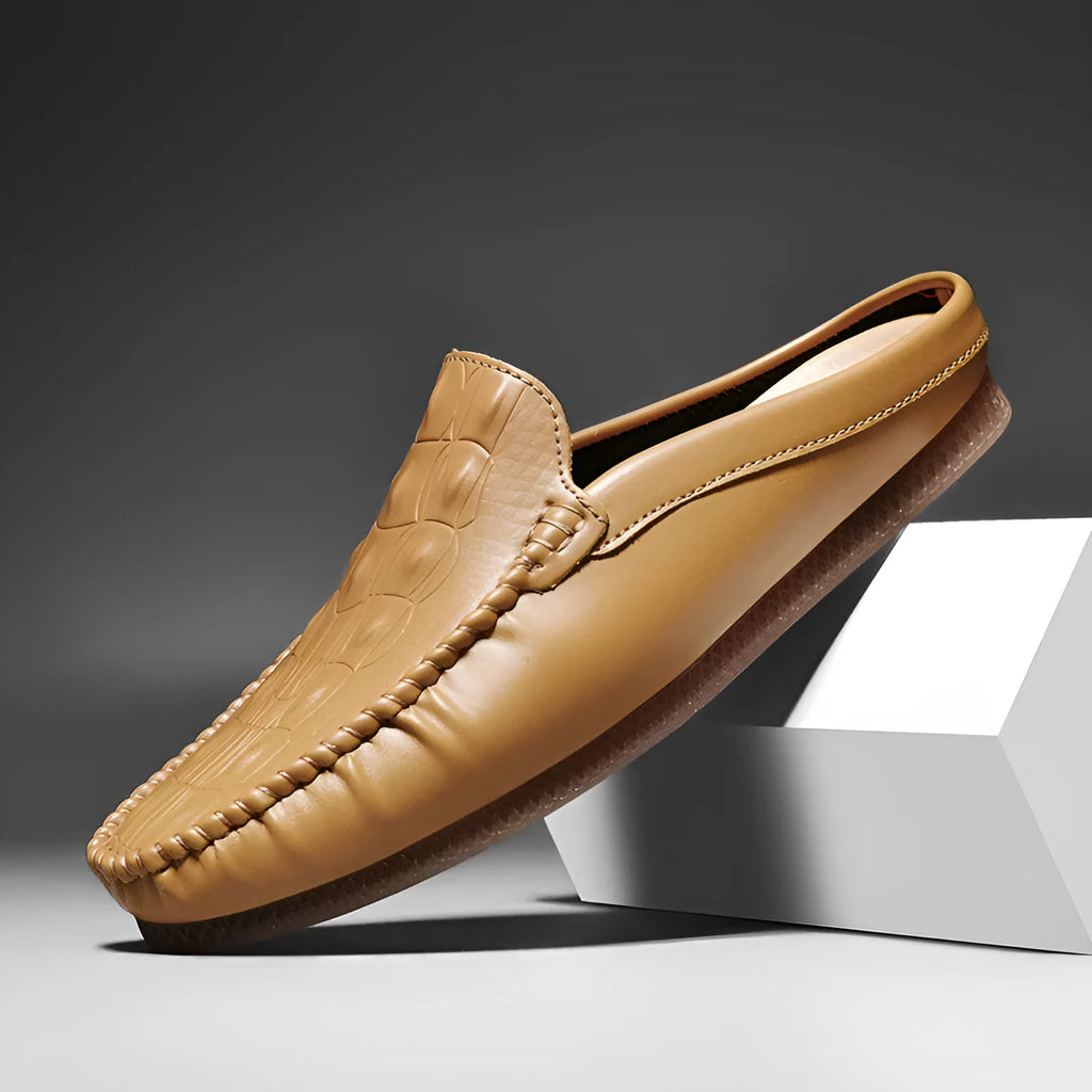 Men's black breathable Gommino semi-slippers with artificial PU upper and rubber sole on a white background