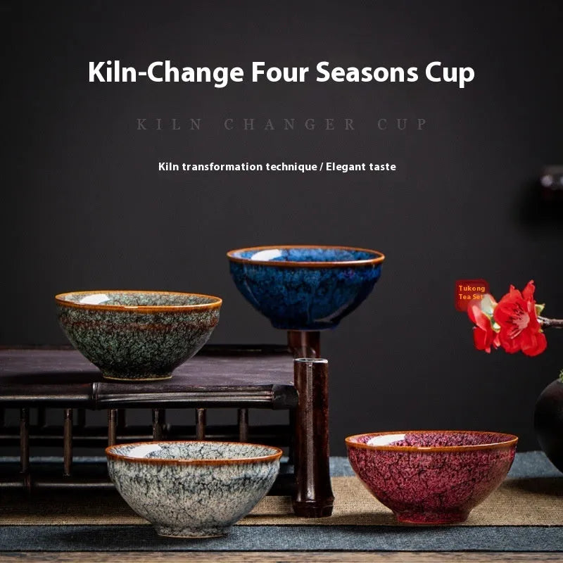 Four ceramic Kung Fu tea cups in a light colour gift box, new Chinese style household tea set.