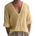 Men's solid colour V-neck long sleeve t-shirt in washed cotton fabric on a hanger.