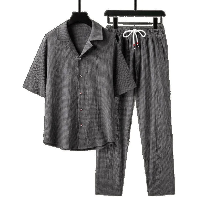 Men's Chinese-style casual two-piece set with short sleeve top and trousers, shown in available colour options.