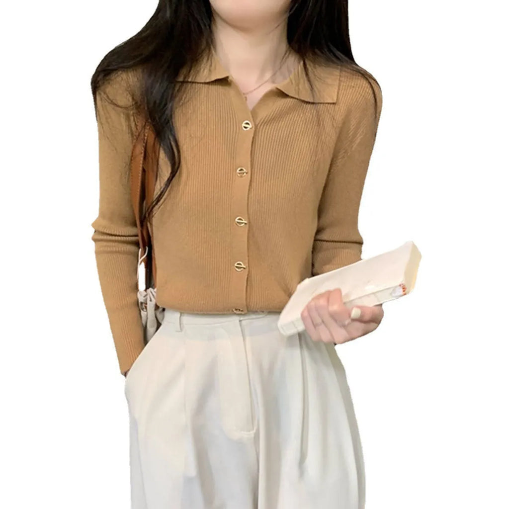 Beige loose-fit long-sleeve viscose knitted cardigan shown on a hanger.