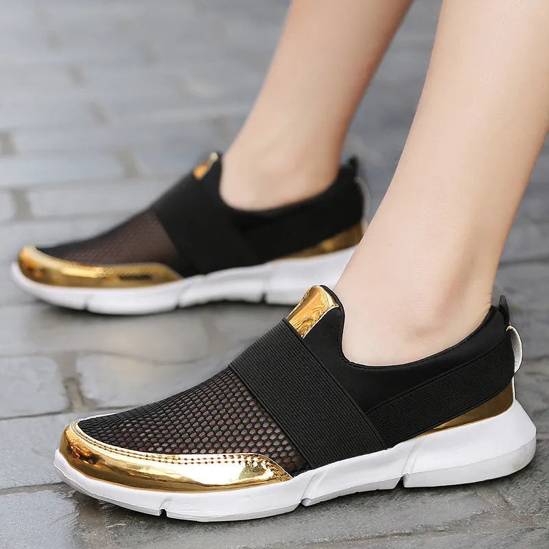Women's low-top casual sneakers in blue, with mesh material and a light-coloured PU midsole.