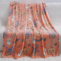 Cartoon patterned flannel blanket showing two size options for use as a child's blanket or air conditioner cover.