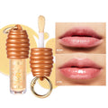 Honey coloured lip gloss with keychain attachment for bags