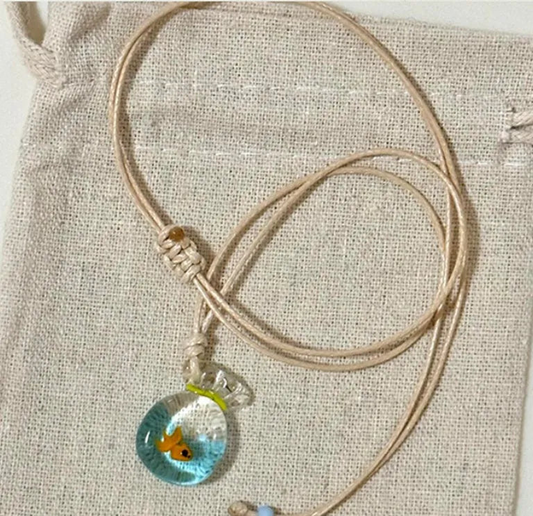 Women's coloured glaze pendant necklace on cotton linen clavicle chain with world style design