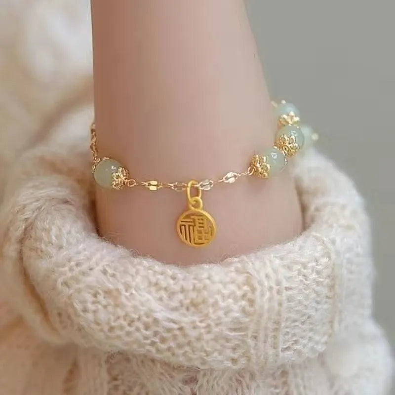 Chinese style glass bamboo leaf bracelet for women with manual craft details.