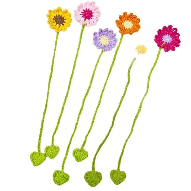 Hand-crocheted flexible wire bookmark with a small daisy design in assorted colours
