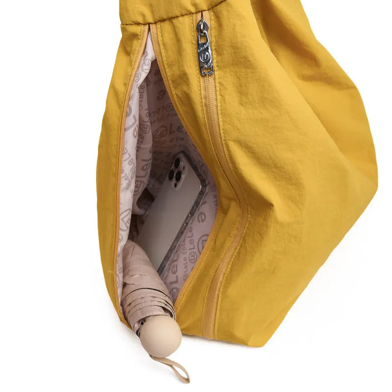 Heart-shaped nylon underarm bag for women in black, blue, khaki, and yellow colour options
