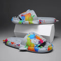 Open-toe shark design couple slippers in EVA material on a white background.