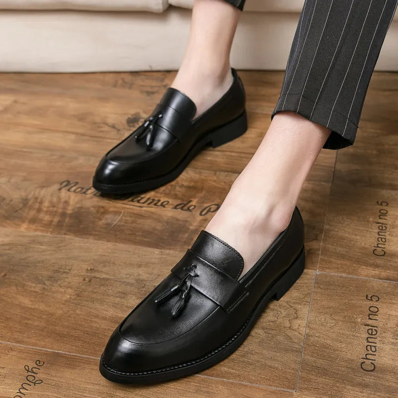 Men's black and brown tassel slip-on business casual shoes with a rubber sole