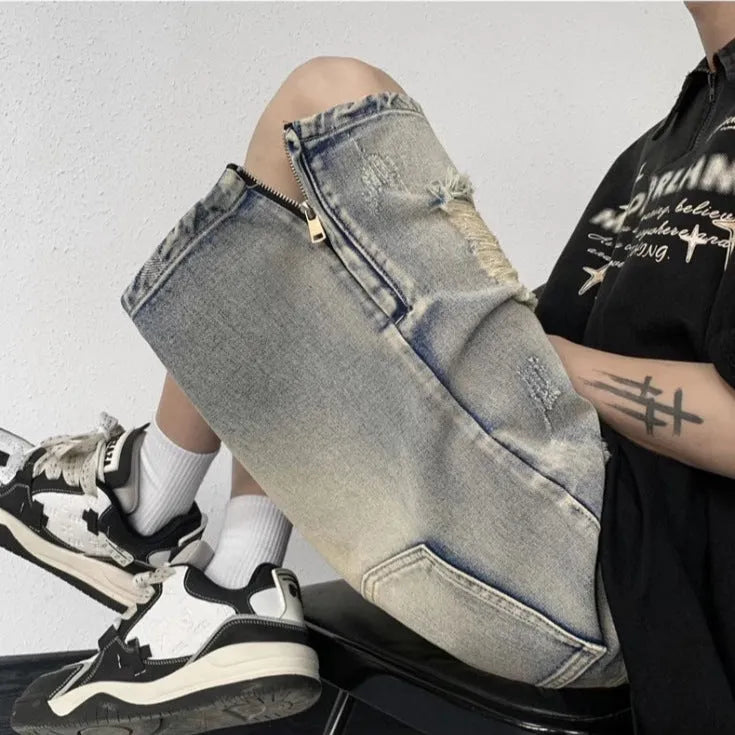 Blue retro denim shorts with a tattered finish and loose wide-leg cut on a mannequin