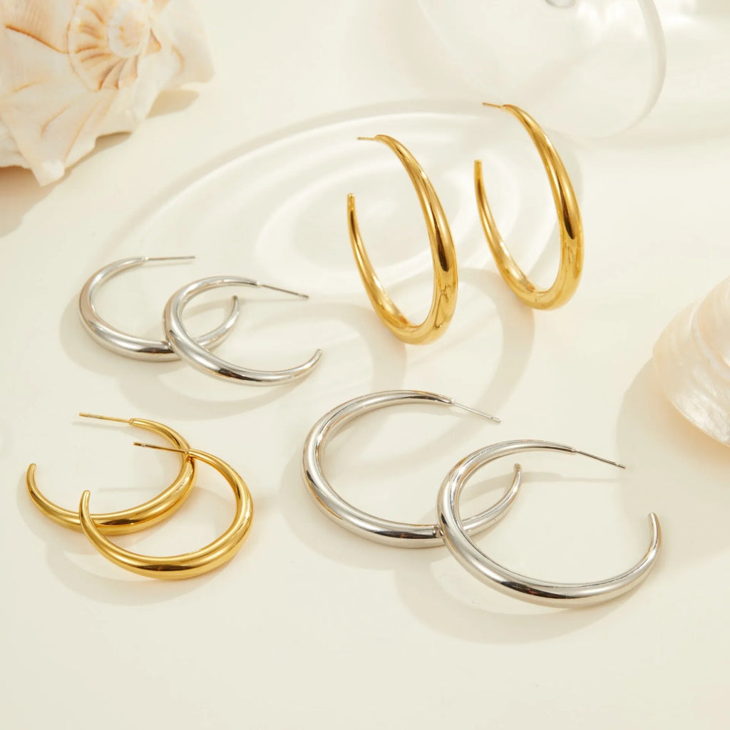 Geometric titanium steel hoop earrings in gold and steel finish options