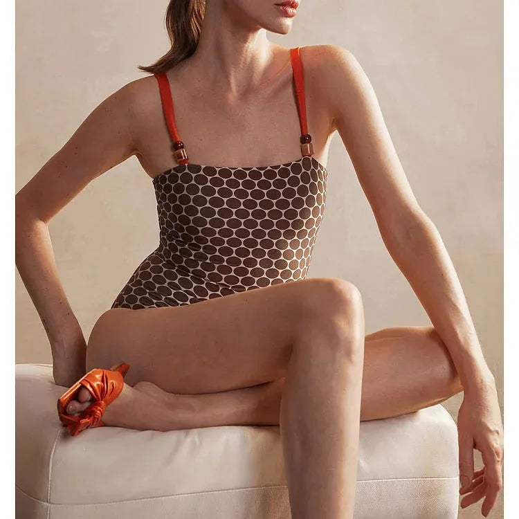 Women's printed dot pattern one-piece swimsuit with matching wrap skirt