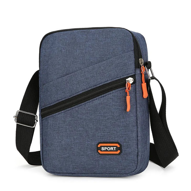 Ultra light Oxford cloth crossbody commuter bag in black, navy blue, or silver grey.