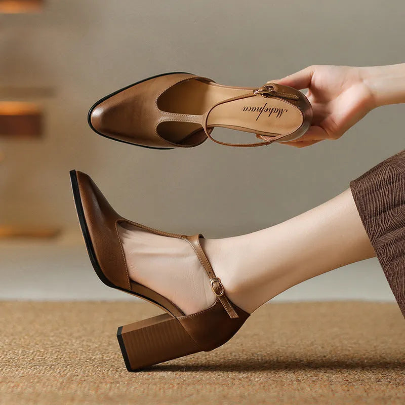 Women's dark brown retro pointed toe Mary Jane shoes with a buckle fastening.