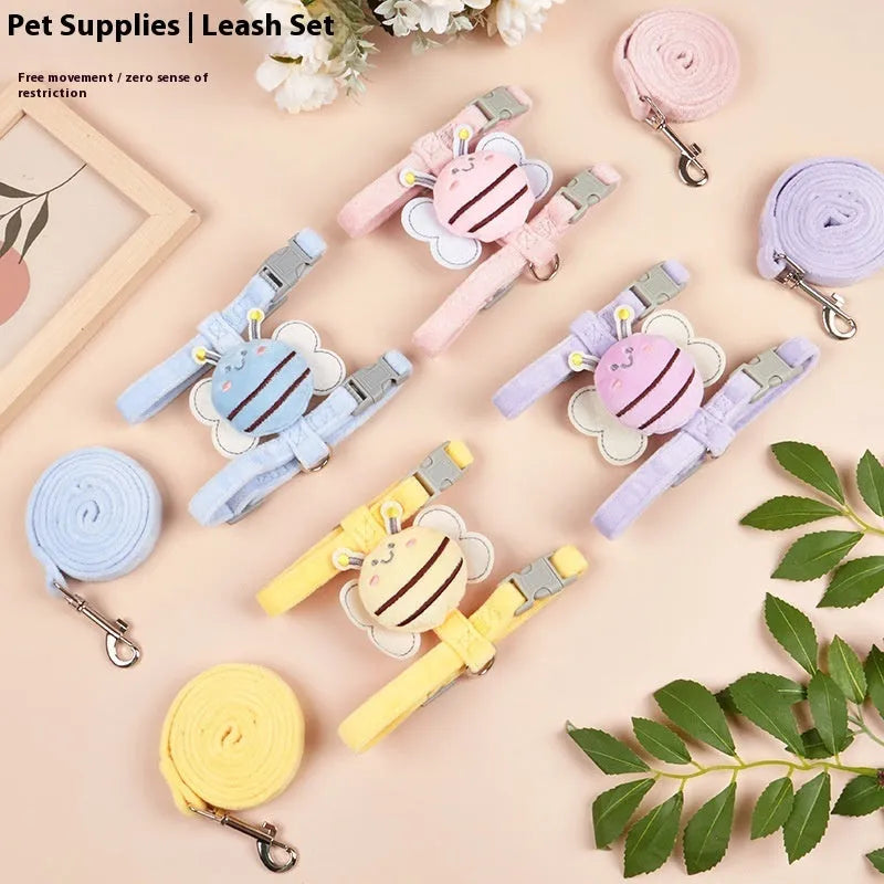 Pink bee-shaped adjustable cat tether rope with strap for outdoor use.