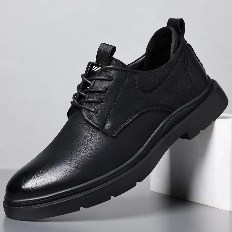 Men's black leather business shoes with rubber soles and sewing line detail