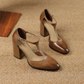 Women's dark brown retro pointed toe Mary Jane shoes with a buckle fastening.