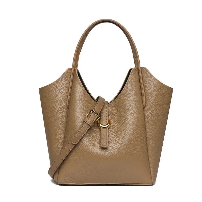 Genuine leather women's large capacity hand holding bucket bag in retro style.