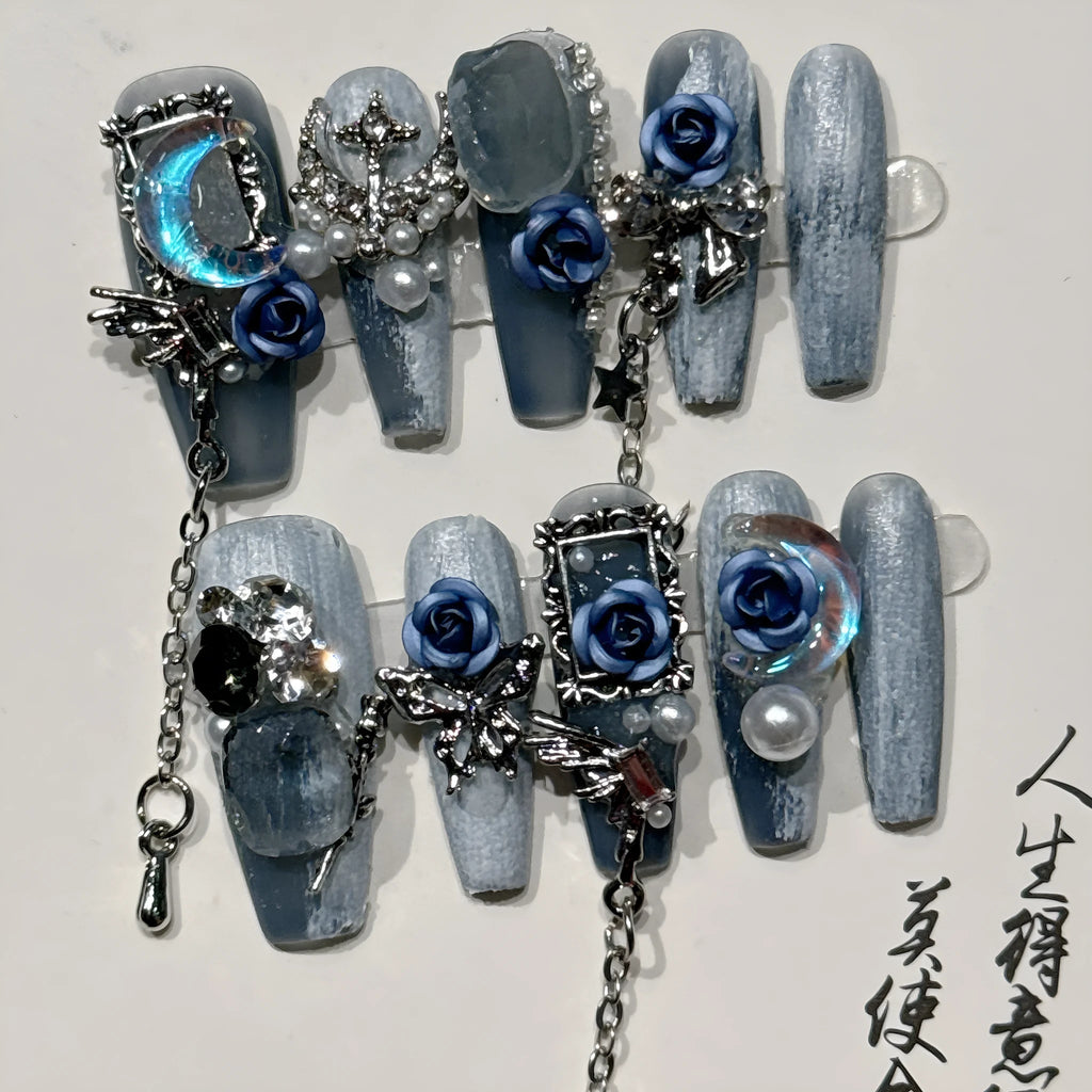 False nails with rose floral patterns in night blue colour, size options displayed
