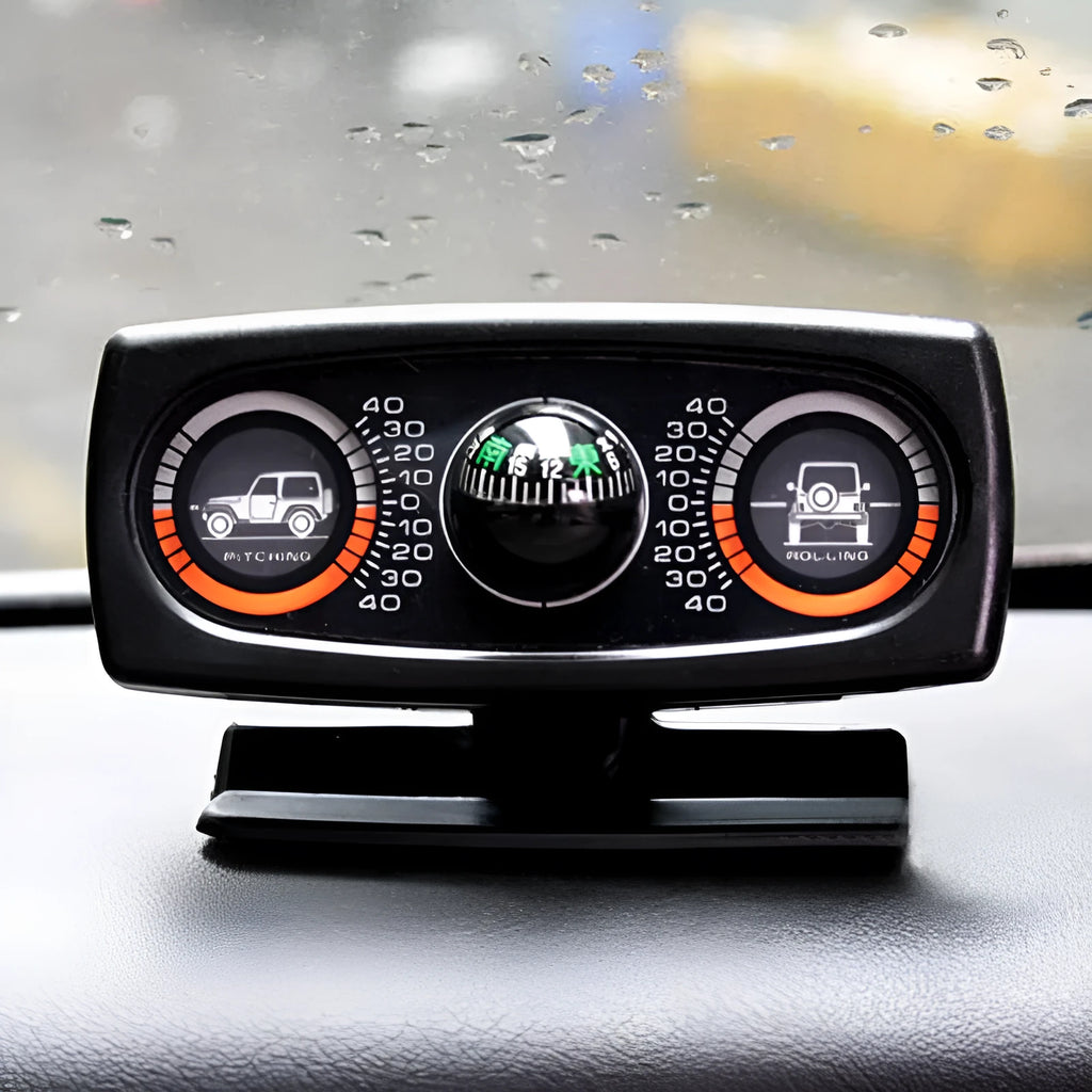 Black car inclination meter with ball balancer and self-adhesive base on dashboard