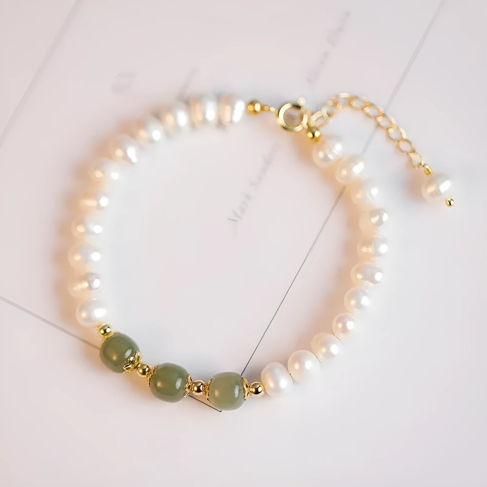 Diamond-shaped freshwater pearl bracelet in Hetian jade colour with electroplated finish