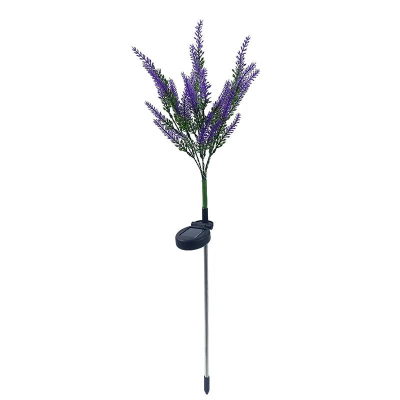 74cm tall pink lavender-shaped solar garden light with green stem, placed in a garden bed.