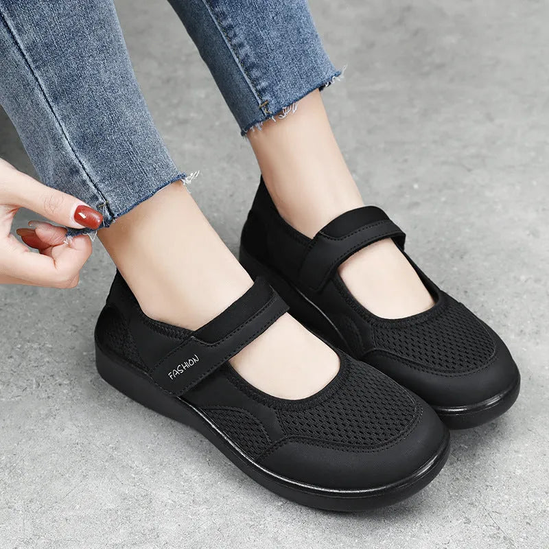 Women's breathable mesh casual shoes with Velcro closure in black, gray, pink, and red colours
